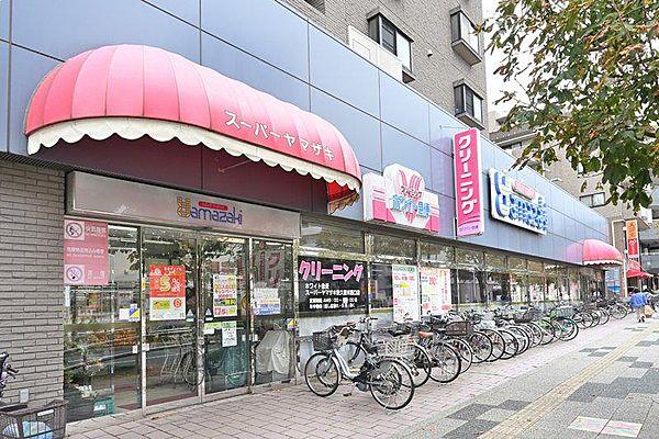 【周辺】スーパーヤマザキ東久留米西口店まで858ｍ