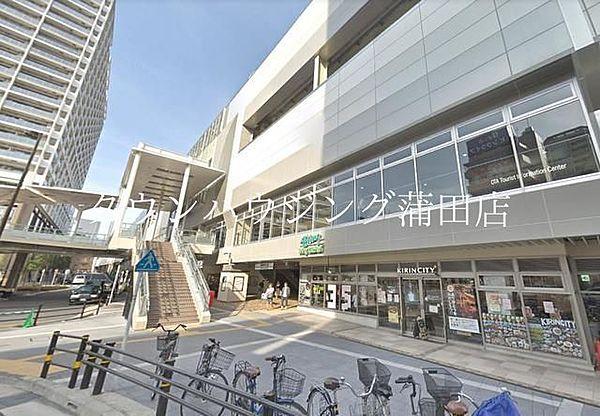 【周辺】ウィングキッチン京急蒲田店 徒歩8分。ショッピングセンター 580m