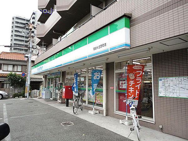 【周辺】ファミリーマート尼崎大庄西町店　 86m