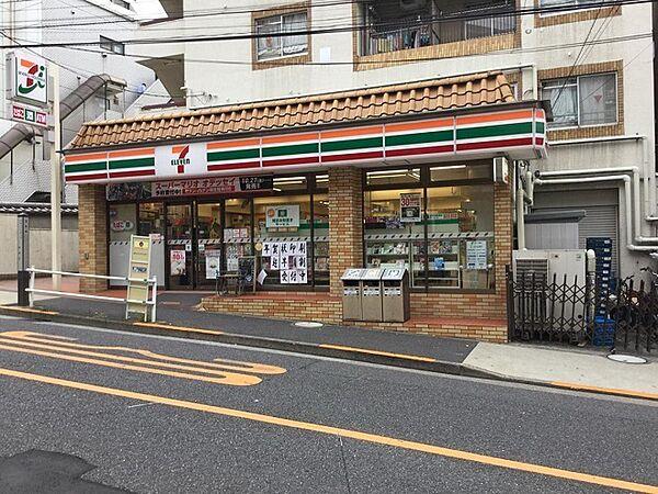 【周辺】セブンイレブン 新宿喜久井町店　（徒歩4分）