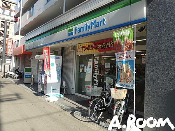 【周辺】ファミリーマート 十三塚本店 263m