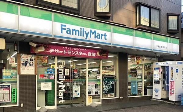 【周辺】ファミリーマート和泉多摩川駅前店 710m