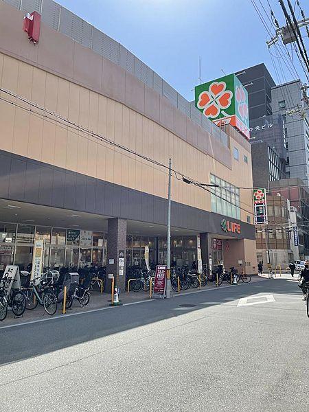 【周辺】ライフ堺筋本町店（徒歩7分）