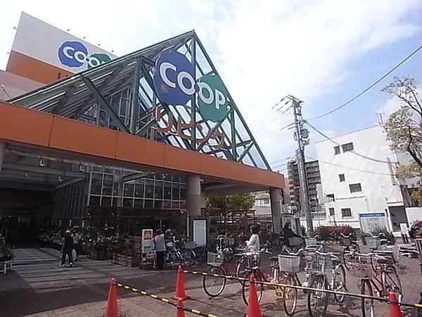 【周辺】コープリビング甲南店（96m）