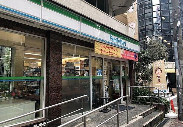【周辺】ファミリーマート南堀江1丁目店 100m