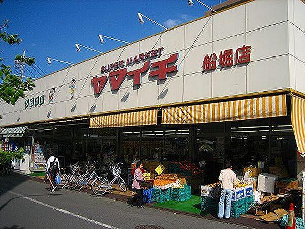 【周辺】スーパー「まいばすけっと東小松川2丁目店まで638m」