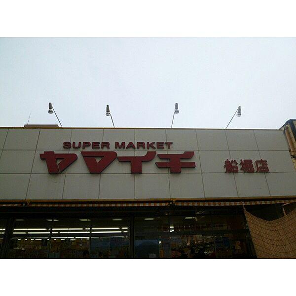 【周辺】スーパー「まいばすけっと東小松川2丁目店まで552m」