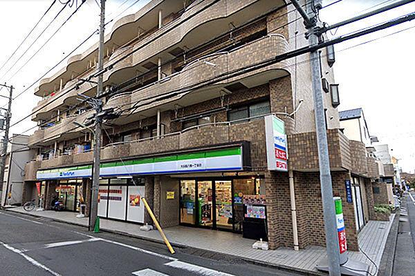 【周辺】ファミリーマート大田西六郷一丁目店まで600m