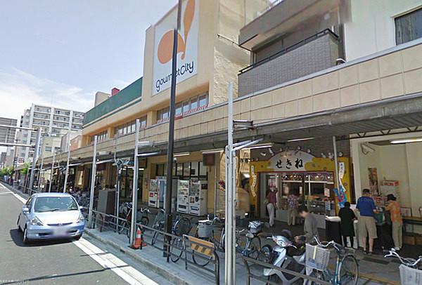 【周辺】グルメシティ八幡町店まで550m