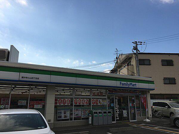 【周辺】ファミリーマート藤井寺小山四丁目店まで1080m